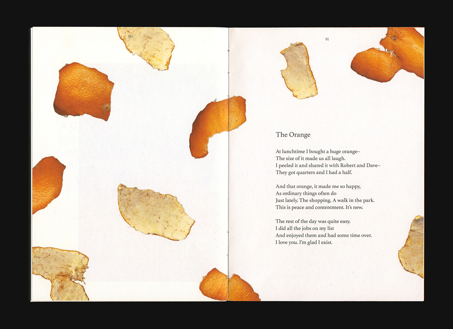 Book spread with aa poem and orange peels.