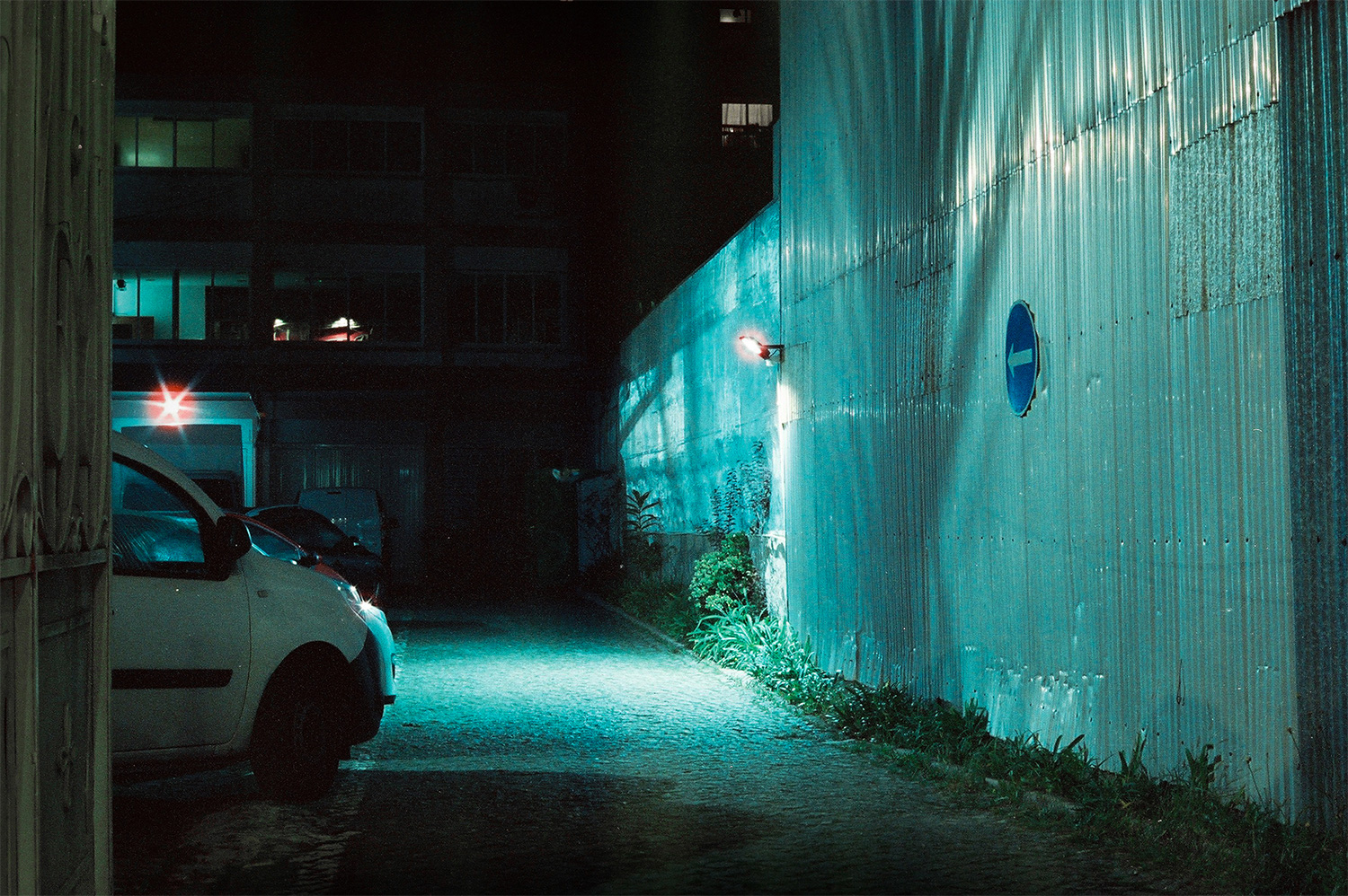 Analog photo of a driveway at night.